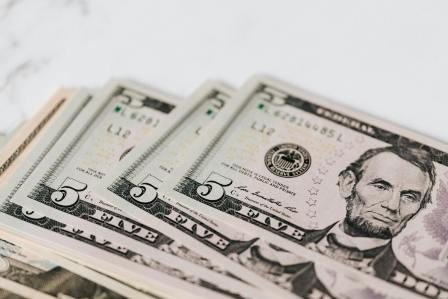counterfeit 5 dollar bill